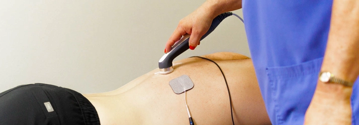 Ultra sound on a patients back.